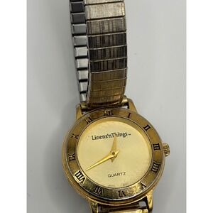 Linens n Things Quartz Gold Tone Stretch Band Watch Roman Numerals